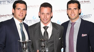 Oren Alexander, Tal Alexander and Alon Alexander getty
