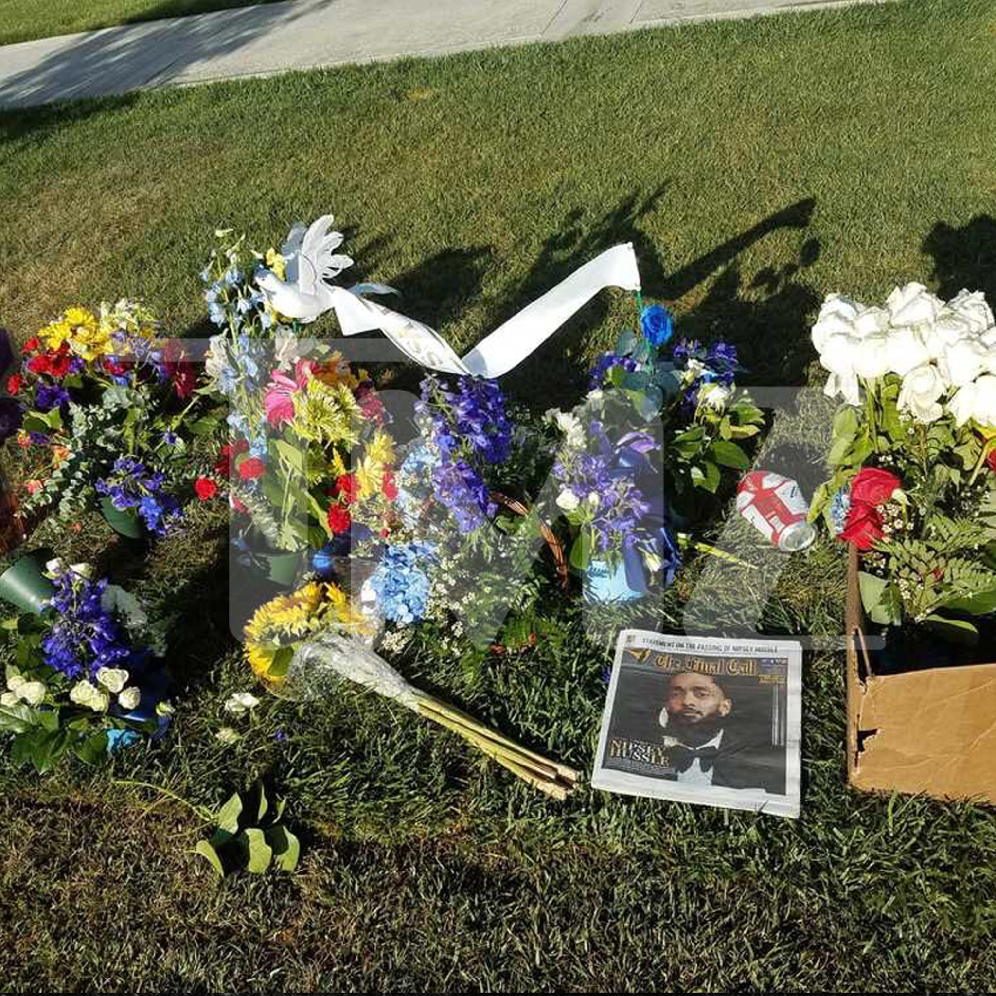 Nipsey Hussle's Hollywood Hills Gravesite Flooded with Flowers