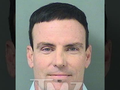 0219-vanilla-ice-mugshot-wm