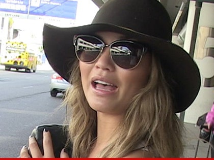 0416-chrissy-teigen-tmz-02