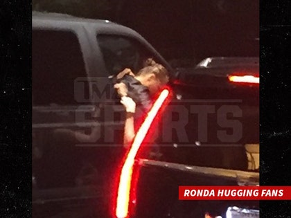 1231-ronda-rousey-hugging-fans-tmz-sports