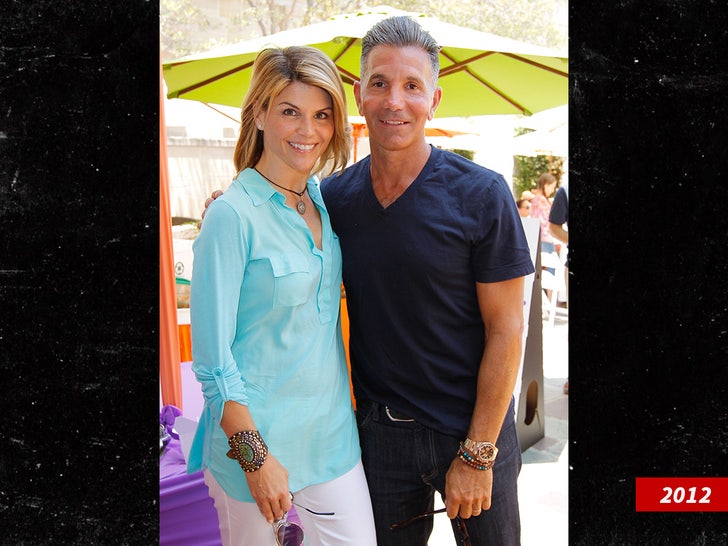 Lori Loughlin and Mossimo Giannulli sub getty swipe 3