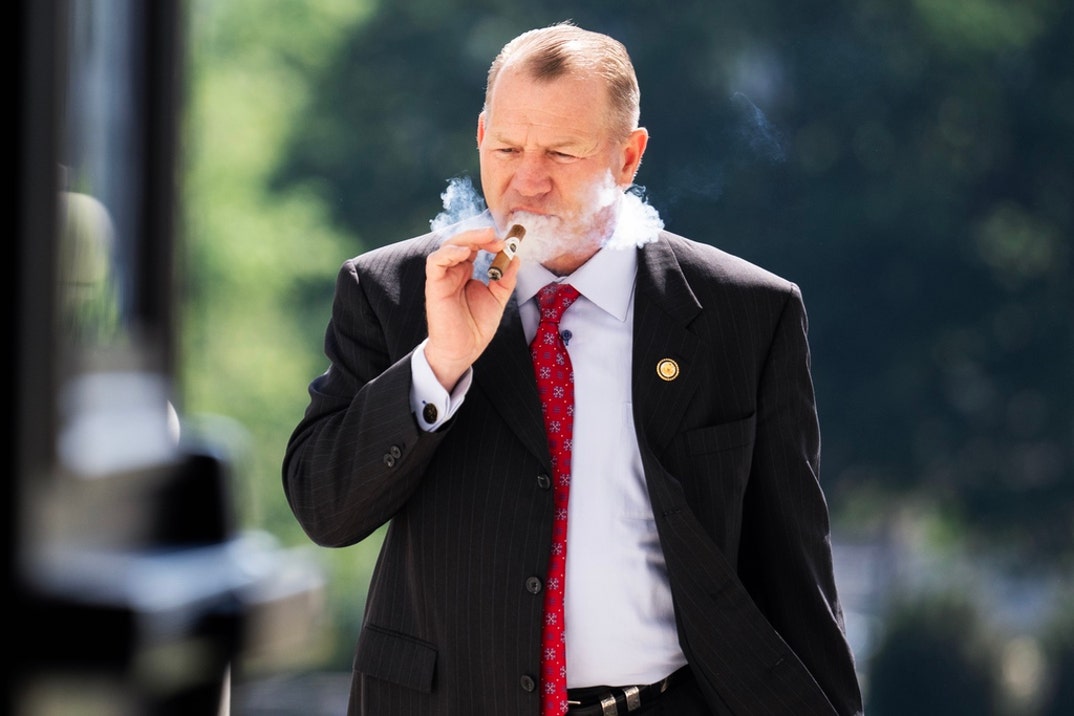 Representative Troy Nehls Smoking Cigars 8