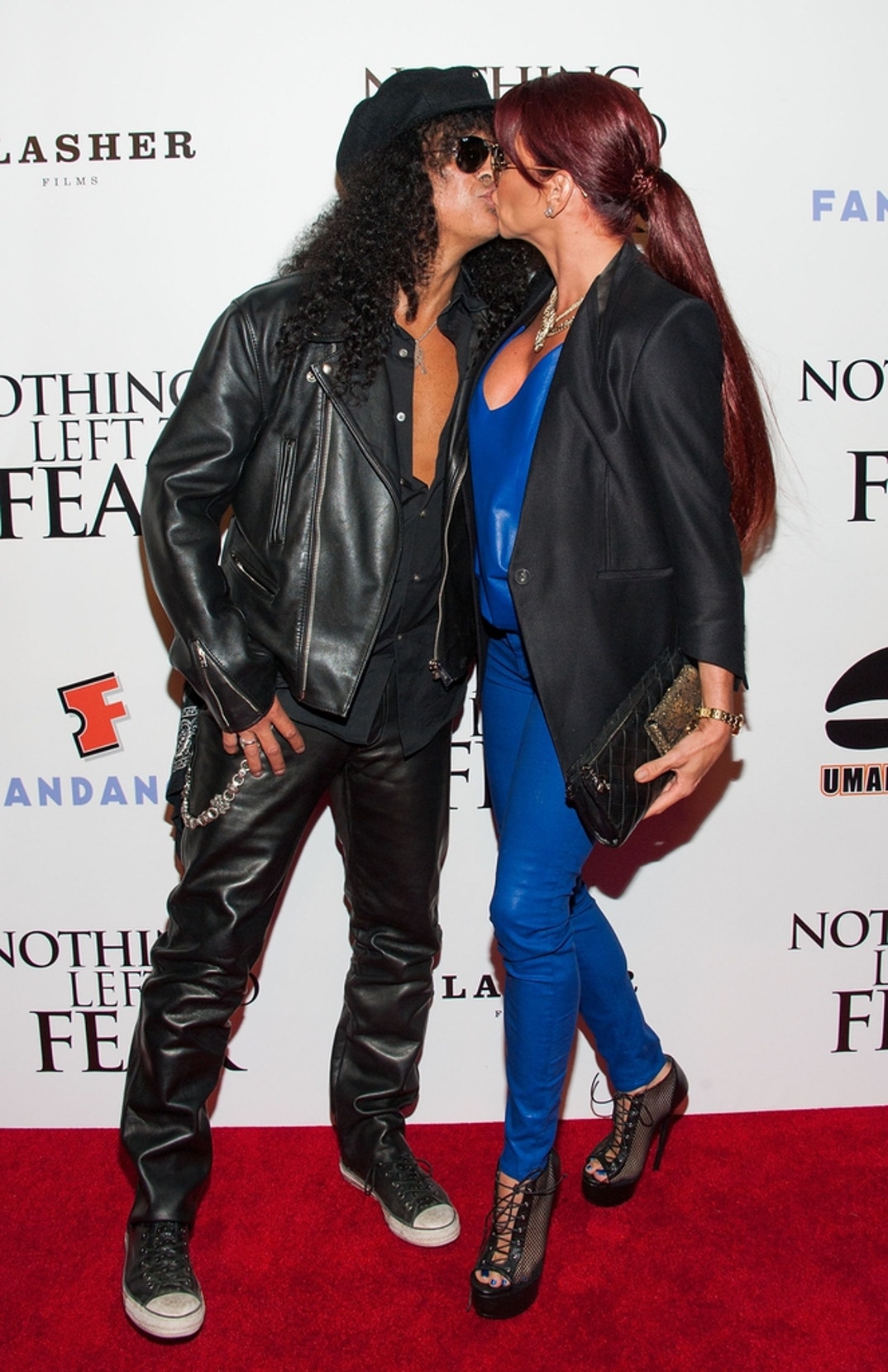Slash and Perla Ferrar Happier Times 12