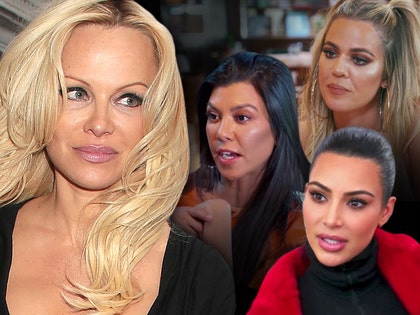 1222-pamela-anderson-kim-kardashian-getty-e-02