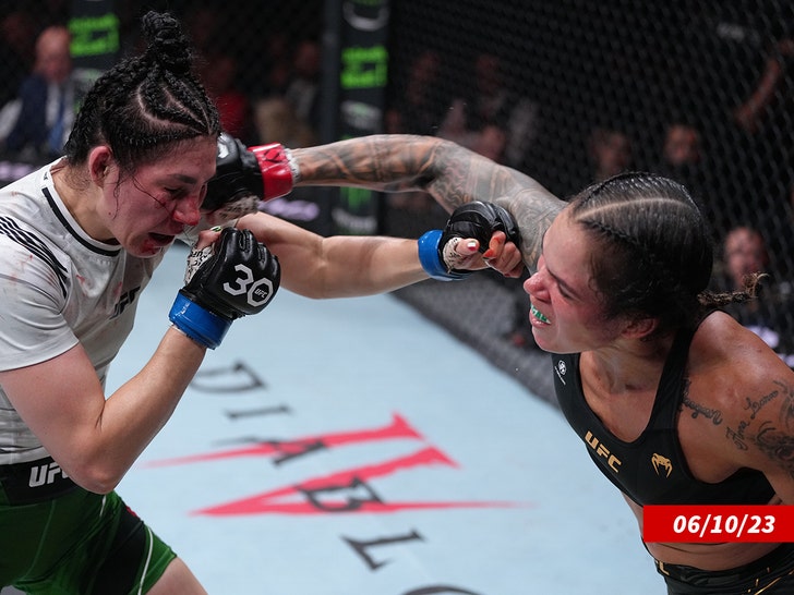 Amanda Nunes of Brazil punches Irene Aldana