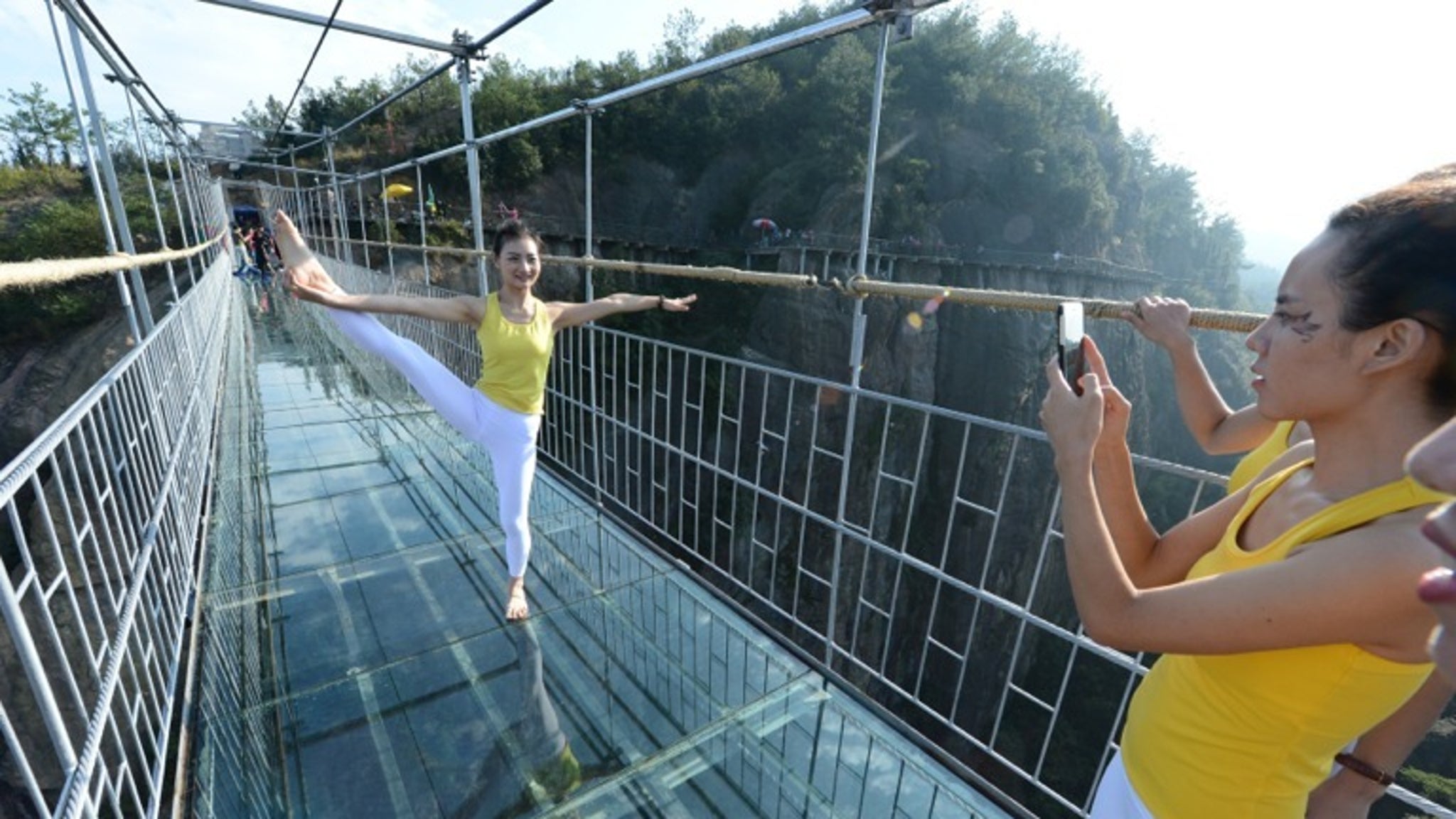 Spandex Clad Yogis Stretch on Sketchy Bridge -- The Suspense!