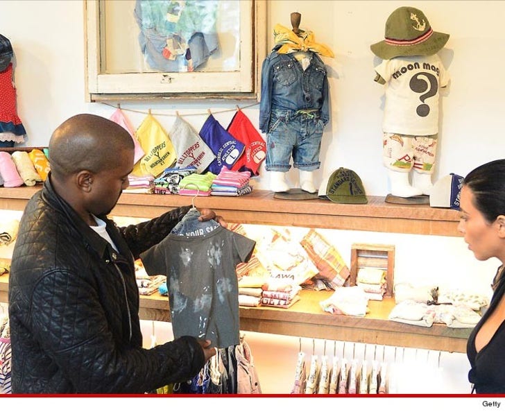 Kim Kardashian -- Boy or Girl I'm Not Baby Shopping :: 0602-kim-kanye-baby-clothes-getty-3