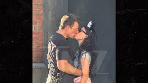 Nathan Fillion and Tania Raymonde at Disneyland tmz 3