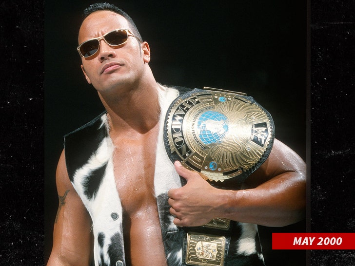 the rock with wwe belt