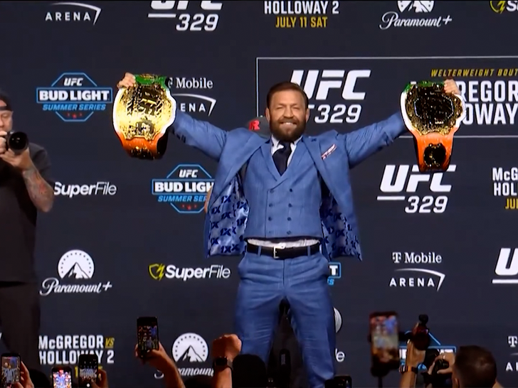 071026_conor_mcgregor_belts