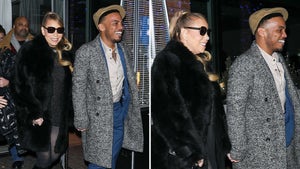 Mariah Carey And Anderson Paak Holding Hands In Aspen