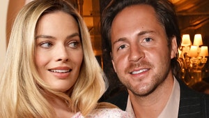 margot robbie and tom ackerley