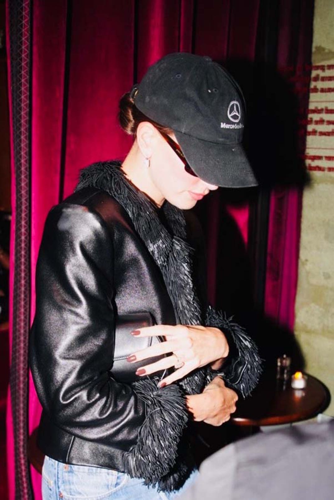 Hailey went lowkey in a baseball cap and leather jacket