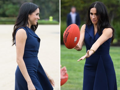 1018_meghan_markle_baby_bump_handball_primary