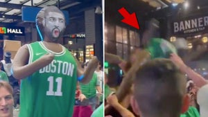 Celtics Fans Bring Kyrie Blowup Doll To Game 1, Beat It Up After Win