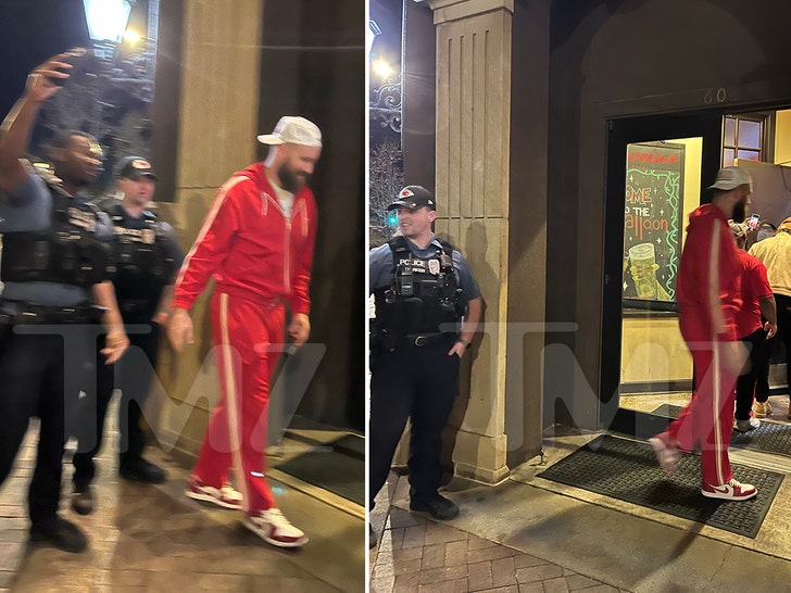 Travis Kelce Takes Picture With Cop After Parade