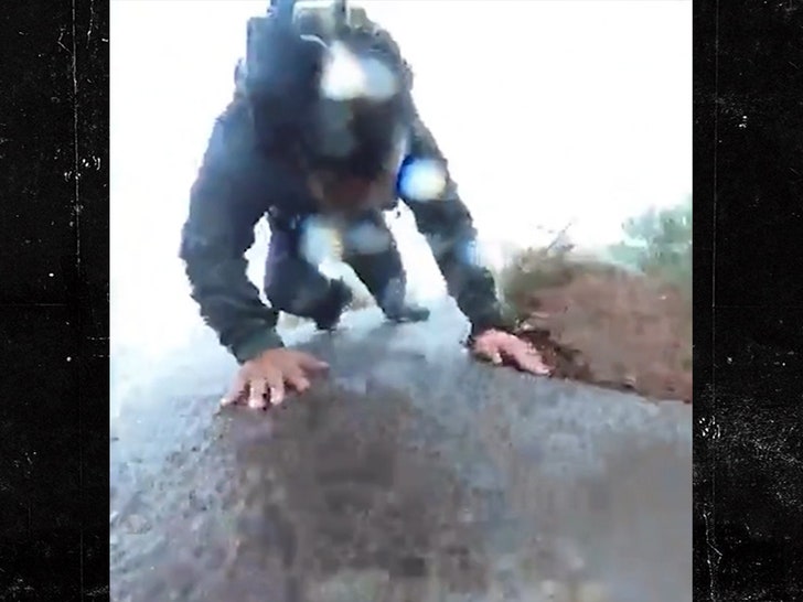 VIDEO: Mountain hiker miraculously escapes steep fall after slipping during rainy trek