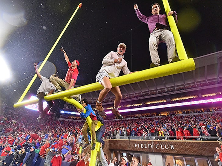 Ole Miss Fans Rush Football Field During Game Vs. UGA