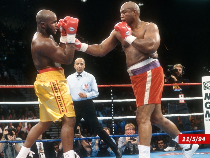 George Foreman fighting against Michael Moorer