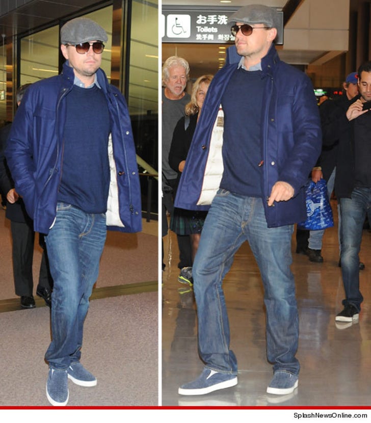 Leonardo DiCaprio -- Heads Up at the Airport :: 0301-leonardo-dicaprio-japan-airport-splash-article-3