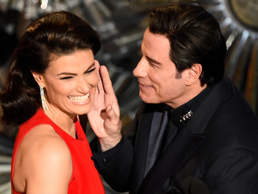 The following year, Idina was in on the joke and chummed up with John on stage.