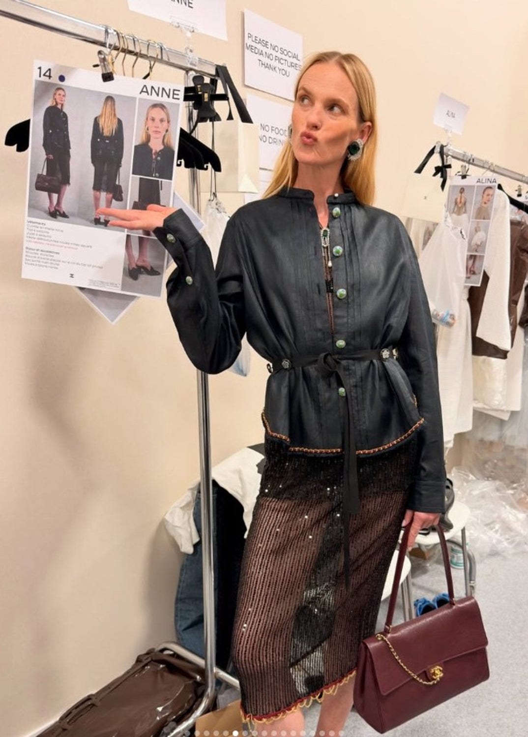 The Lions Anne V showed off her Chanel look backstage before walking the runway.