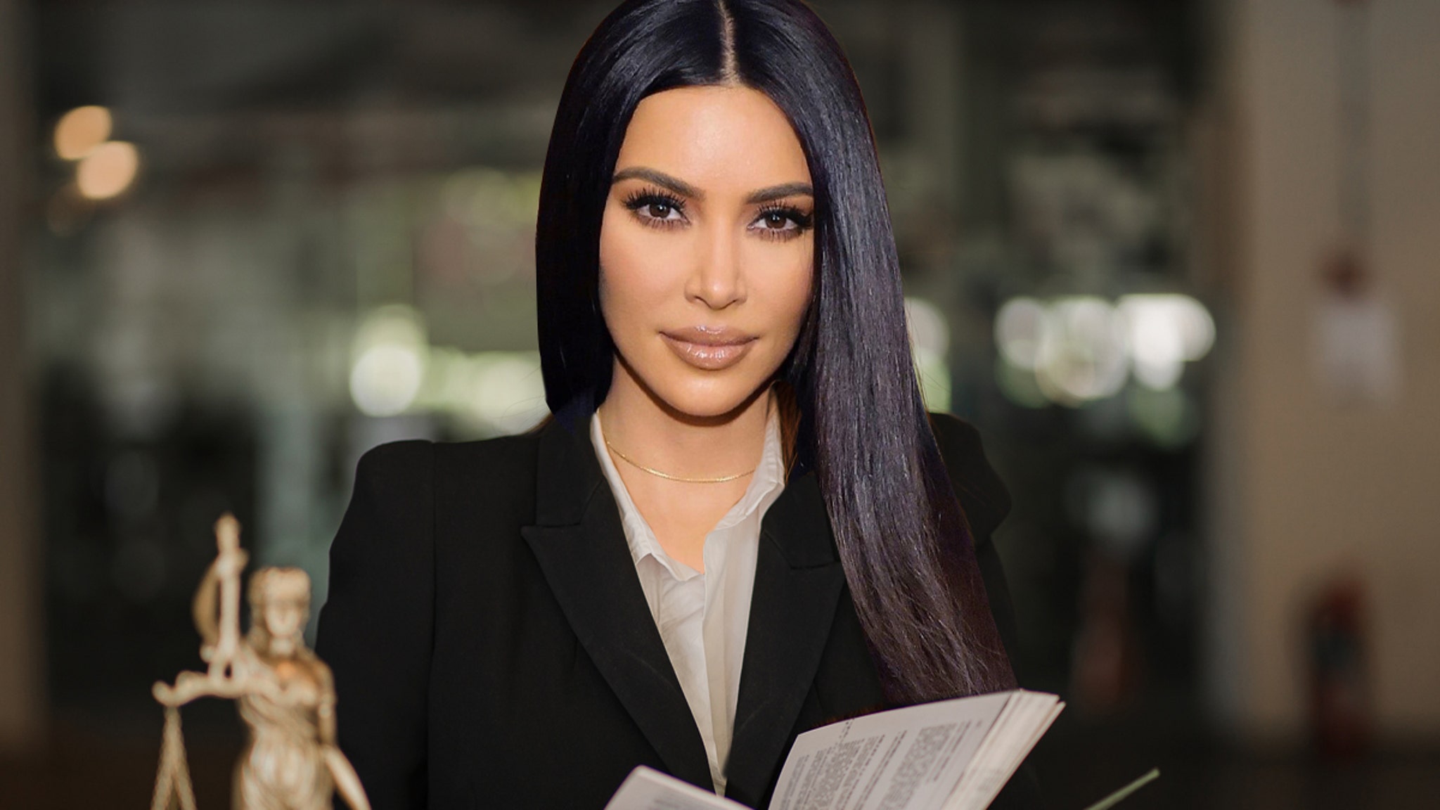 Kim Kardashian Reminds Fans She's Still in Law School With Sultry Selfie