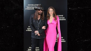 Elizabeth-Hurley-and-Billy-Ray-Cyrus-getty-1
