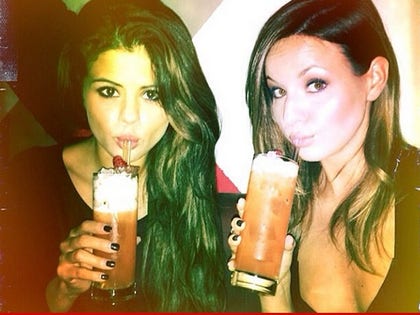 0217_selena_gomez_drinking_twitter