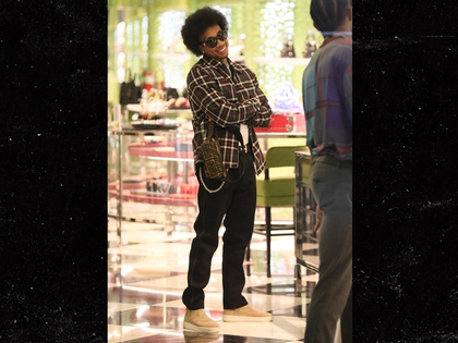 1221-tyga-afro-backgrid