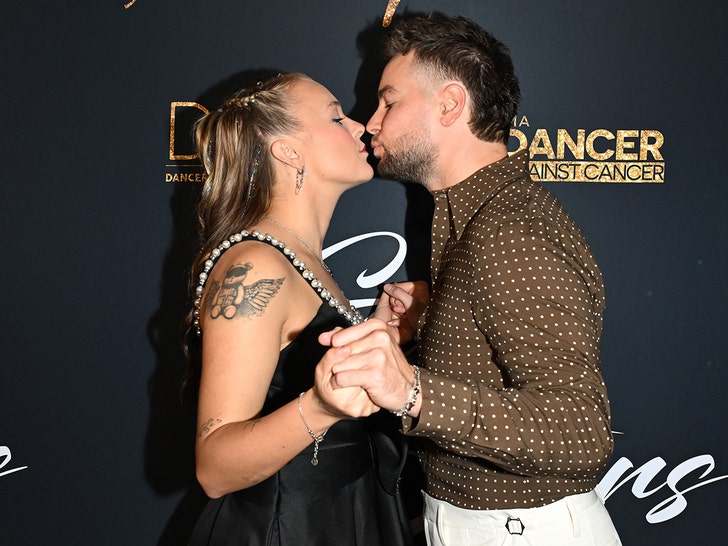 JoJo Siwa and Chris Hughes Pack on the PDA at Dancers Against Cancer Event