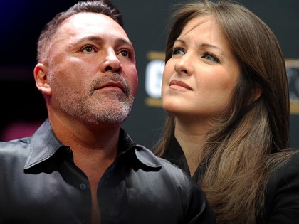millie corretjer and oscar de la hoya getty 3