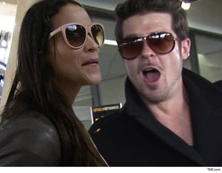 Paula Patton Says Her Son Has Deep Emotional Issues Caused :: 0126-robin-thicke-paula-patton-tmz-3b-3