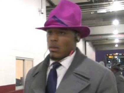 1219_cam_newton_purple_hat_espn