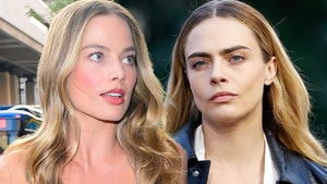 Margot Robbie & Cara Delevingne Rushed by Photog in Argentina, Friends Help