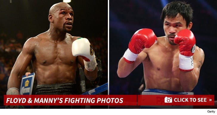 Floyd Mayweather & Manny Pacquiao's Fighting Photos