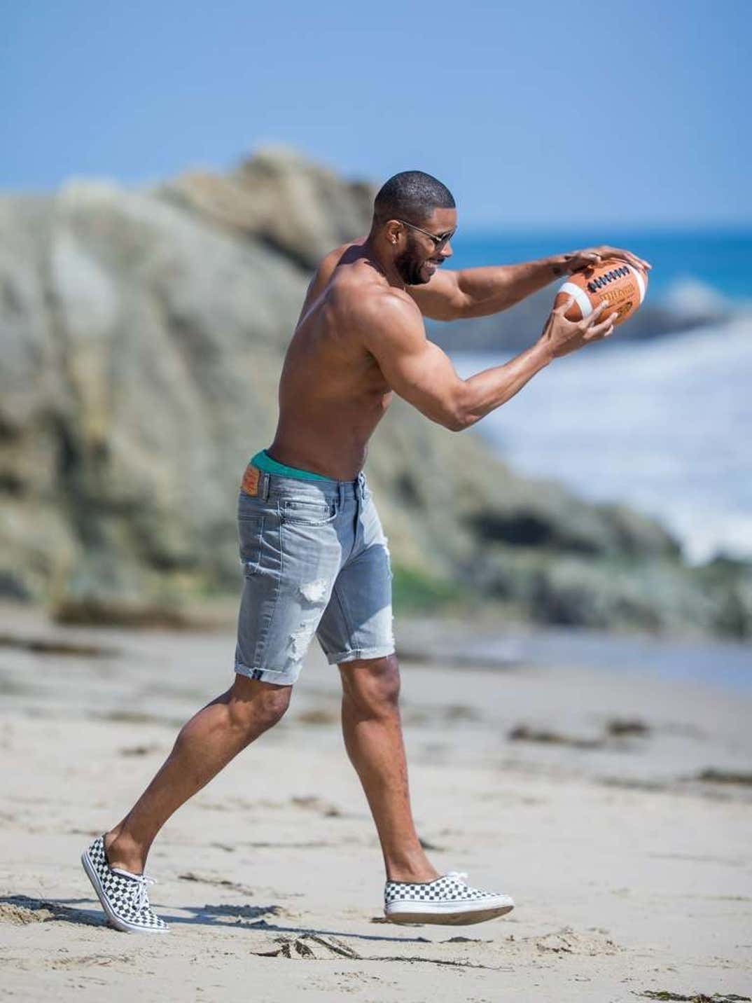 NFL's Kerry Rhodes Ballin' On the Beach  With Hot Fiancee