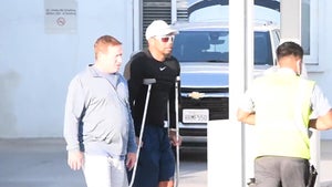 Tiger Woods Returns to L.A. After Car Crash, Moving Pretty Well on Crutches!