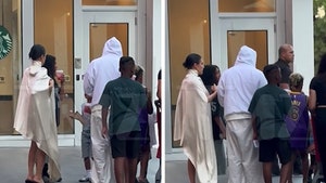 Bianca Censori Wears Loose Poncho for Target Run With Kanye West & Kids