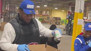 NYG's Kayvon Thibodeaux Spends Day Off Loading Boxes With Food For Families In Need