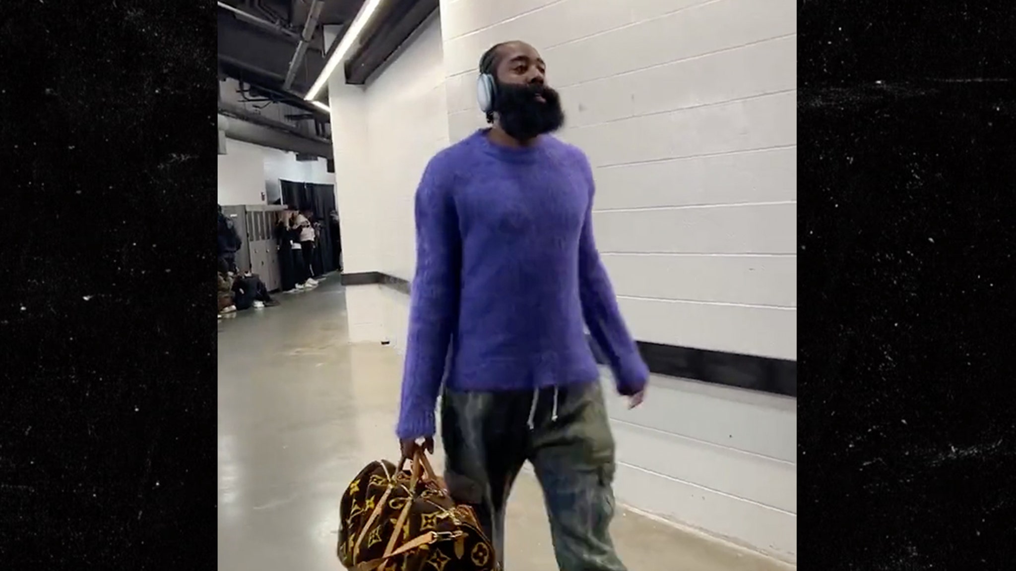 James Harden playoff outfit? A letterman jacket adorned with flamingo