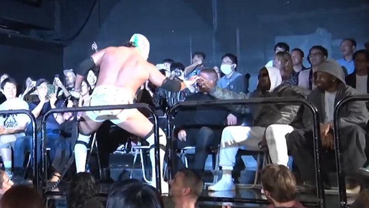 Kanye West Fist Bumps La Dinastia Wagner at Tokyo Wrestling Match