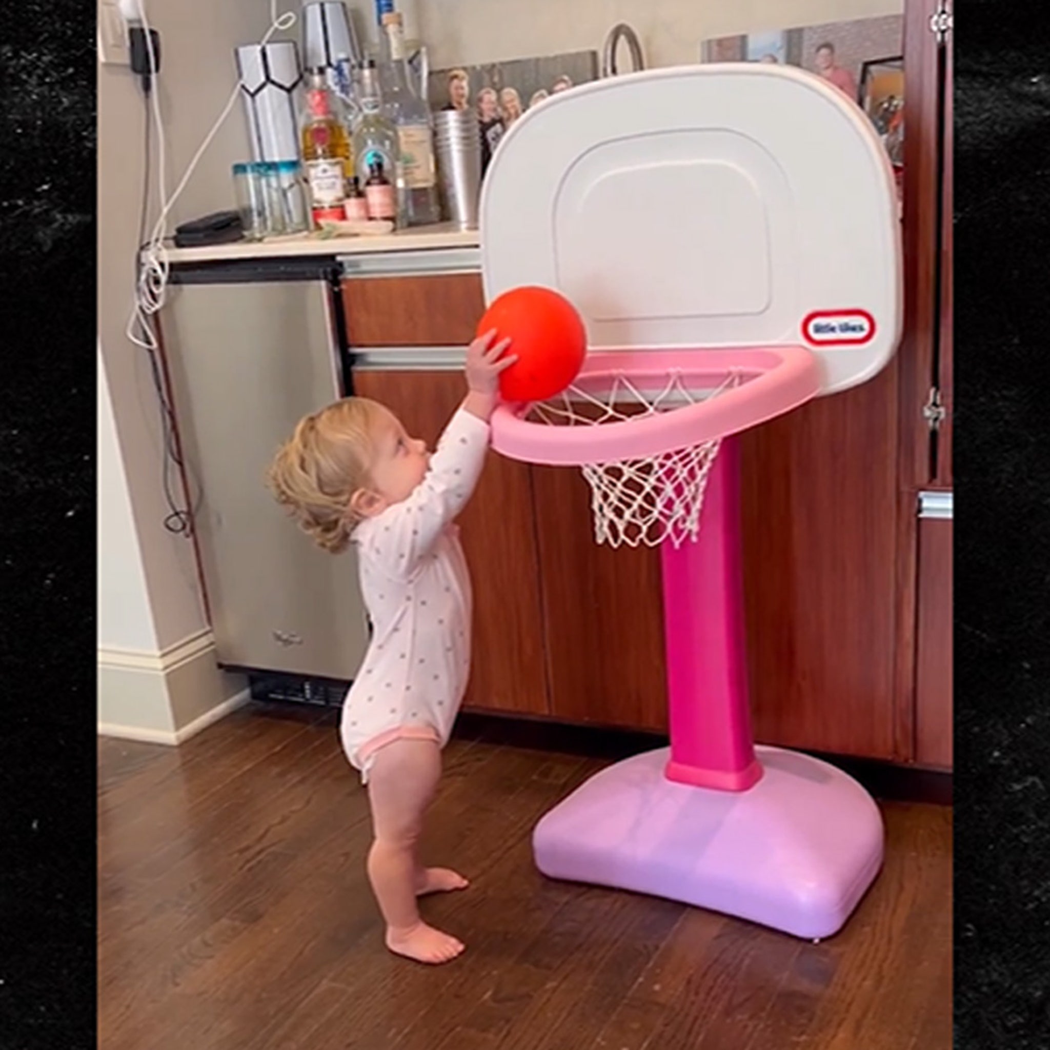 Patrick Mahomes' 1-Year-Old Daughter Shows Off Basketball Skills, Adorably  Dunks Ball