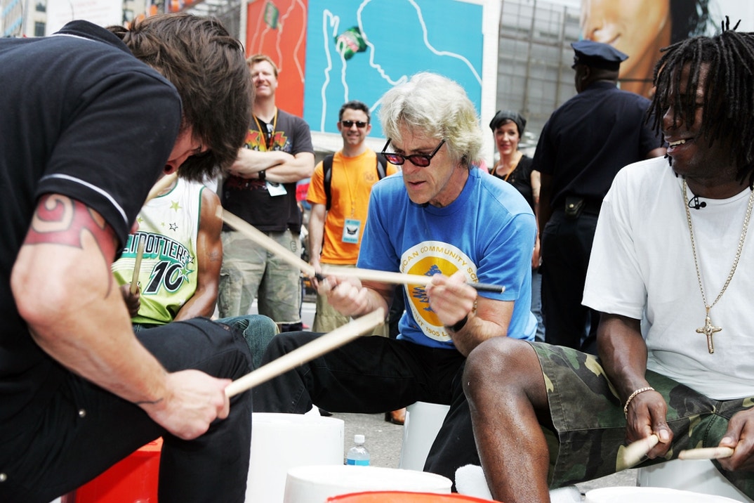 Stuart Copeland (center), formerly of The Police, and Dave Grohl (at left) of the Foo Fighters perform in a drum circle during MTV2's 