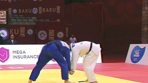 Judo Fighter Disqualified After Phone Falls Out Of Pocket Mid-Match