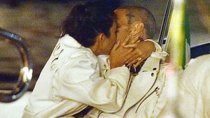 Kourtney Kardashian, Travis Barker Kiss in Matching Mr. and Mrs. Jackets