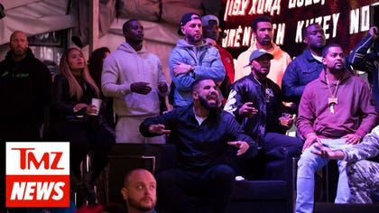 Drake Chugs Champagne After Toronto Win