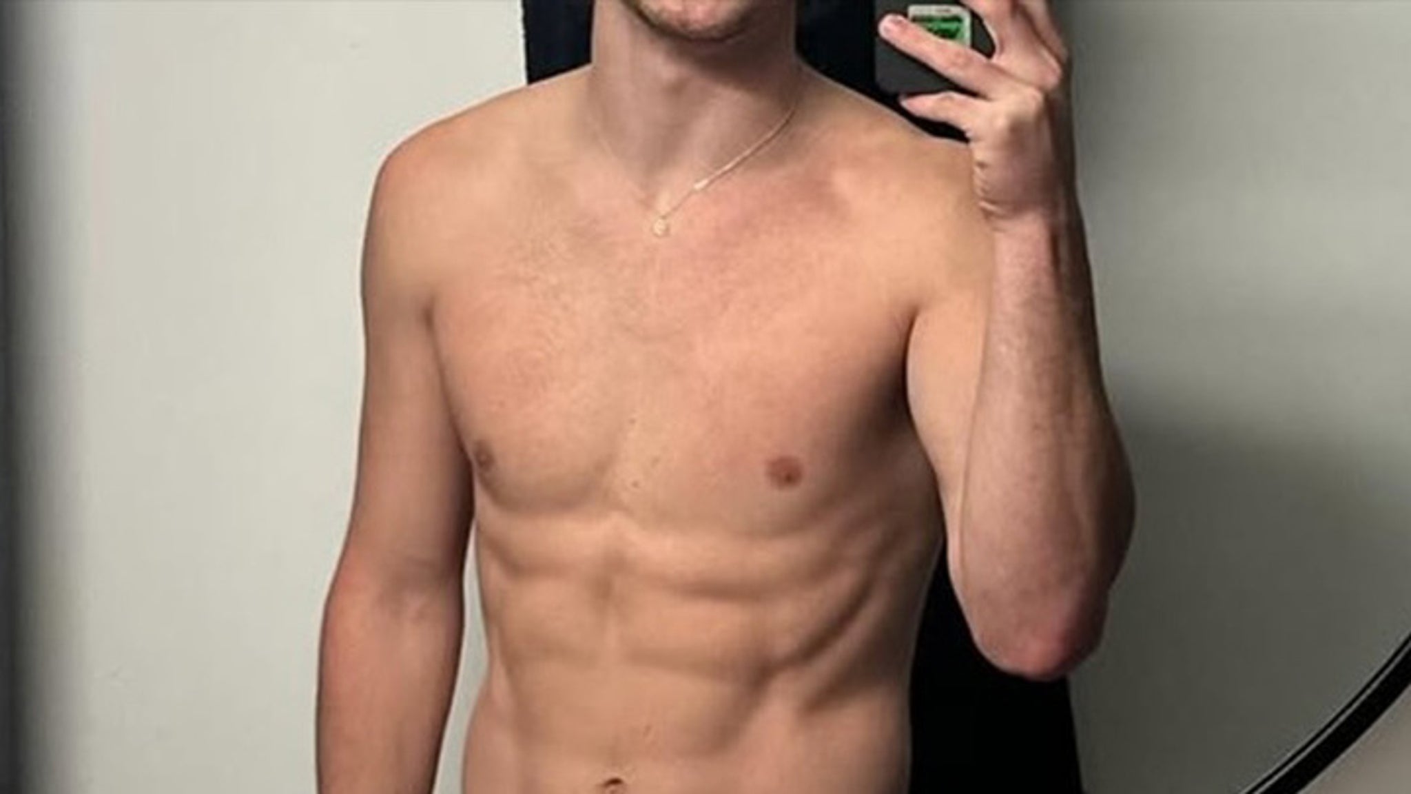 Guess the Shredded Singer in This Shirtless Selfie!