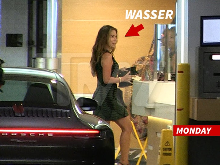 Divorce lawyer Laura Wasser walking in parking lot before Jennifer Lopez and Ben Affleck divorce mediation.